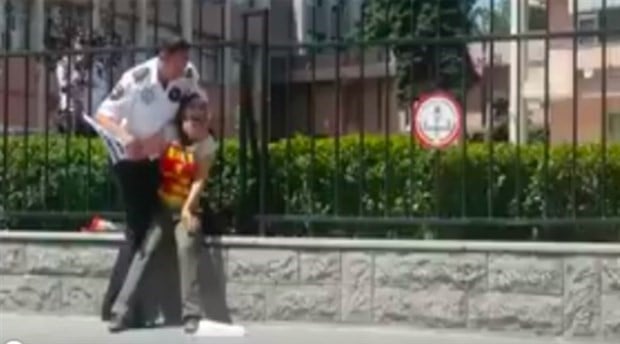 Security in Turkey batters dismissed teacher protesting in front of education ministry
