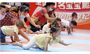 Çin’de üç çocuk: Siz yapın, biz bakalım