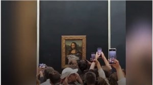 Çevre aktivisti, Mona Lisa tablosuna pasta fırlattı: Gezegeni düşünün